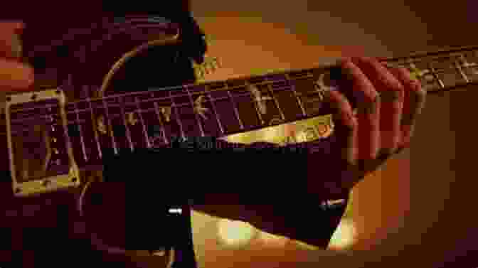 A Close Up Of A Guitar Player's Hands Performing A Fingerstyle Guitar Piece Beginning Fingerstyle Guitar (Complete Method)