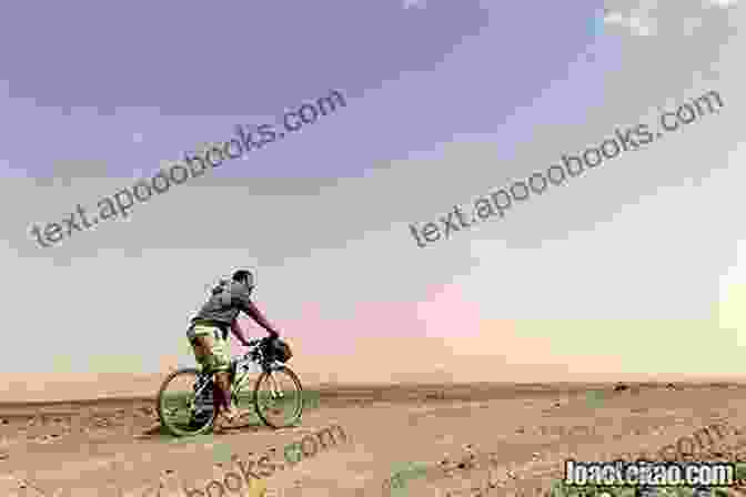 A Cyclist Riding Through The Sahara Desert The Sahara Soliloquies: Across The Sahara On A Bicycle