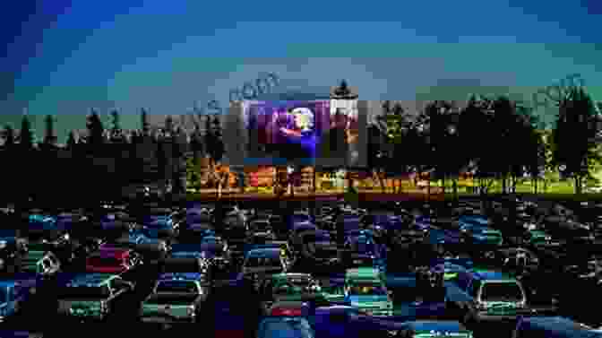 A Drive In Movie Theater With Cars Parked In Front Of A Large Screen Showing A Film. Fifties Flashback: A Nostalgia Trip