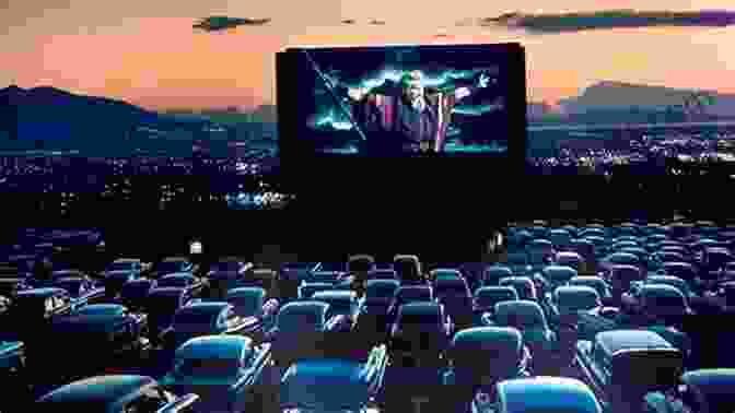 A Drive In Movie Theater With Cars Parked In Front Of A Large Screen Showing A Film. Fifties Flashback: A Nostalgia Trip