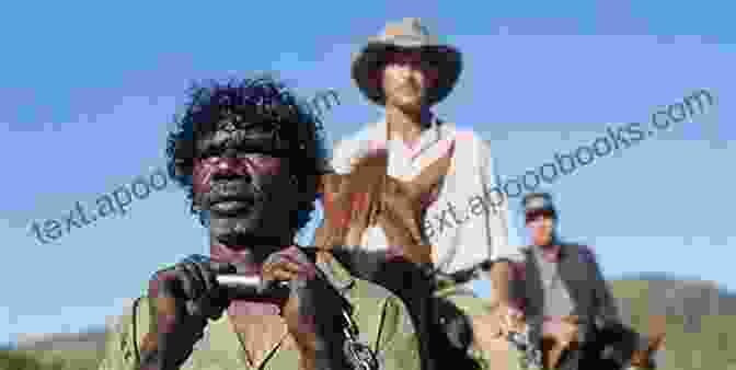 A Still From The Film 'The Tracker', Depicting An Aboriginal Man And A White Woman In The Australian Outback The Lost Child Complex In Australian Film: Jung Story And Playing Beneath The Past