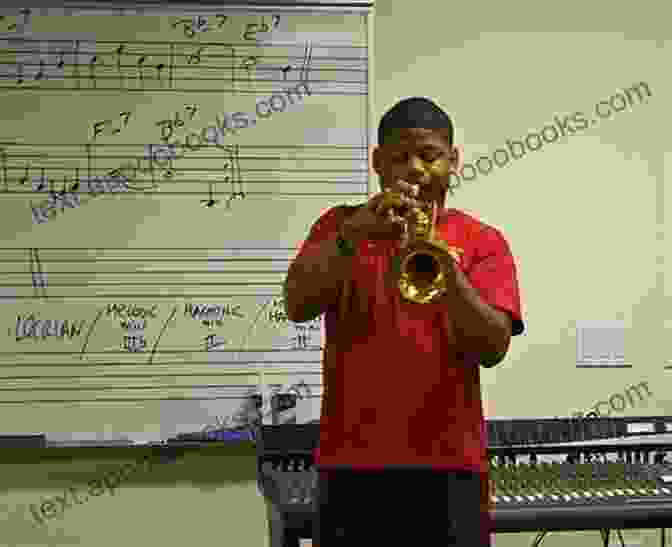 A Trumpet Player Studying Music Scores And Practicing With Focused Determination Trumpets: Tips On Getting Your Trumpet Playing On Point: Learn To Play Trumpet App