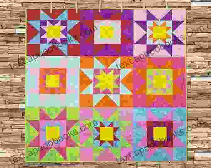 A Vibrant Biscuit Quilt Featuring A Star Pattern Made From Colorful Fabrics Made From Scratch Biscuit Quilts