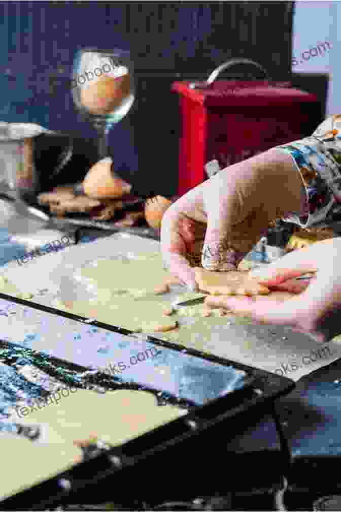 An Artisan Carefully Shaping A Biscuit Dough, Showcasing The Intricate Art Of Biscuit Making. 30 + Easy Healthy Homemade Dog Food And Treats: Biscuits Raw Other Natural Meals From Scratch