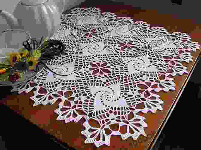 An Intricate Filet Crochet Tablecloth Adorned With Floral Motifs LEARN TO DO 3DC FILET CROCHET: A DETAILED FILET CROCHET TECHNIQUE WITH GRAPH TO HELP CREATE AWESOME PIECE OF ART