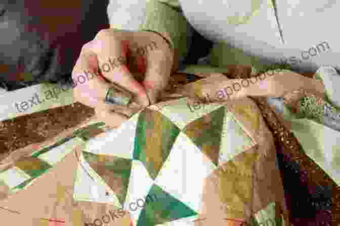 Close Up Of Skilled Hands Quilting A Piece Of Fabric Focus On Heirloom Quilting (Focus On Sewing 3)